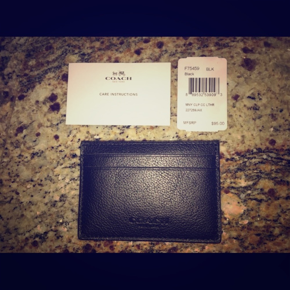 New with tags, black leather COACH money clip